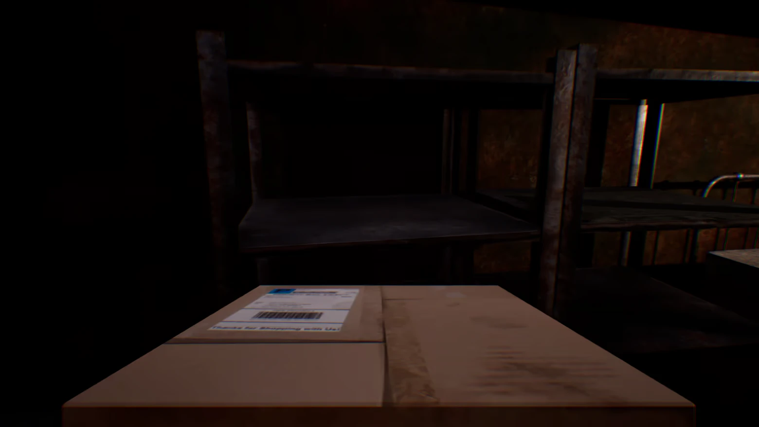 Change: Cardboard box with shipping label and barcode on table in dim room.