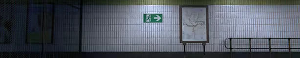 Metrophobia: Tiled metro wall with green exit sign, map board, and metal railing.