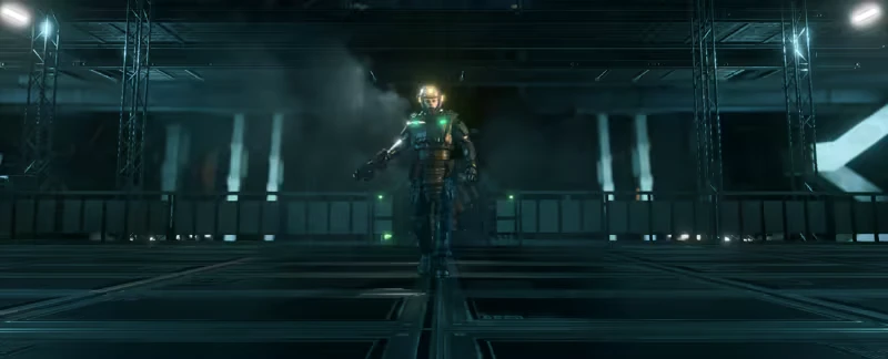 The Warp: A lone armored figure walks through a dimly lit, metallic corridor with glowing lights.