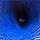 THERMOCLINE: Blurred blue scene with dark central shape and small pale glow near bottom center.