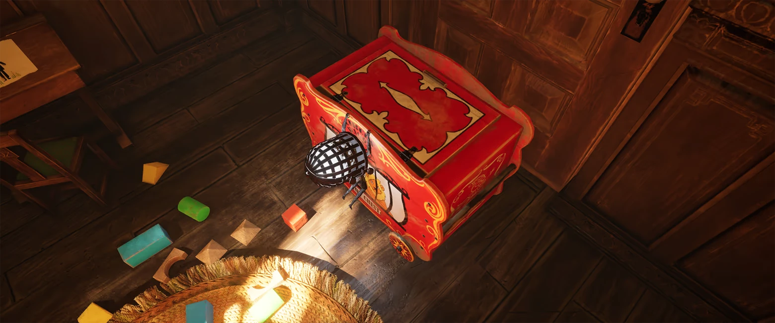 Unseal: Overhead view of red toy chest on wooden floor with scattered blocks and rug.